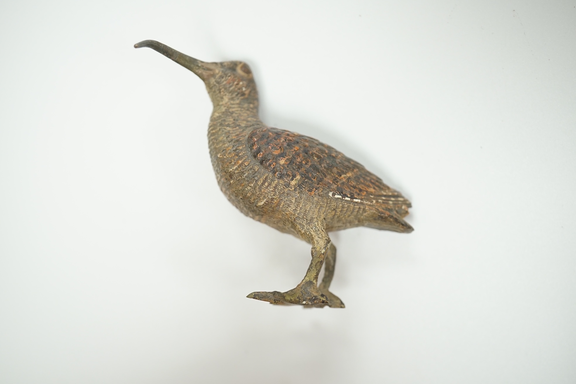 Two early 20th century cold painted bronze Long Billed Curlew, larger 6cm high. Condition fair to poor, smaller has detached foot but present.